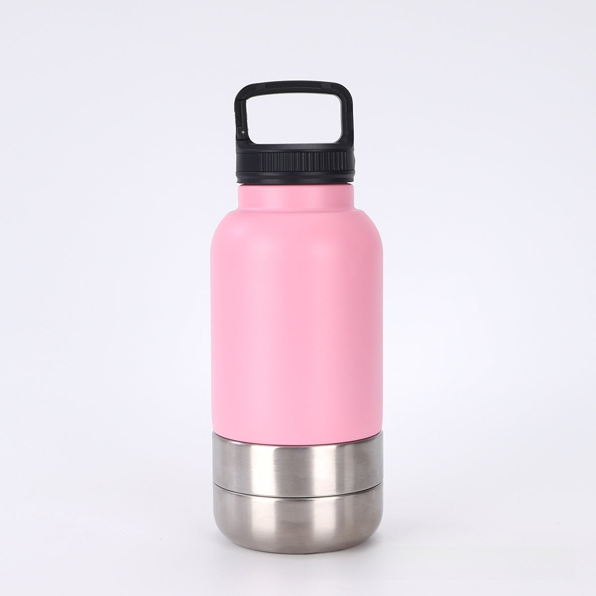 Pink water bottle with black cap on a white background