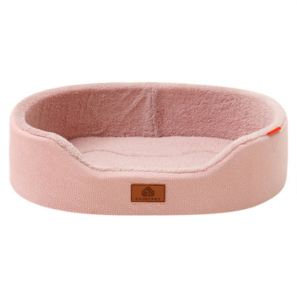 Pink pet bed with size chart on a white background