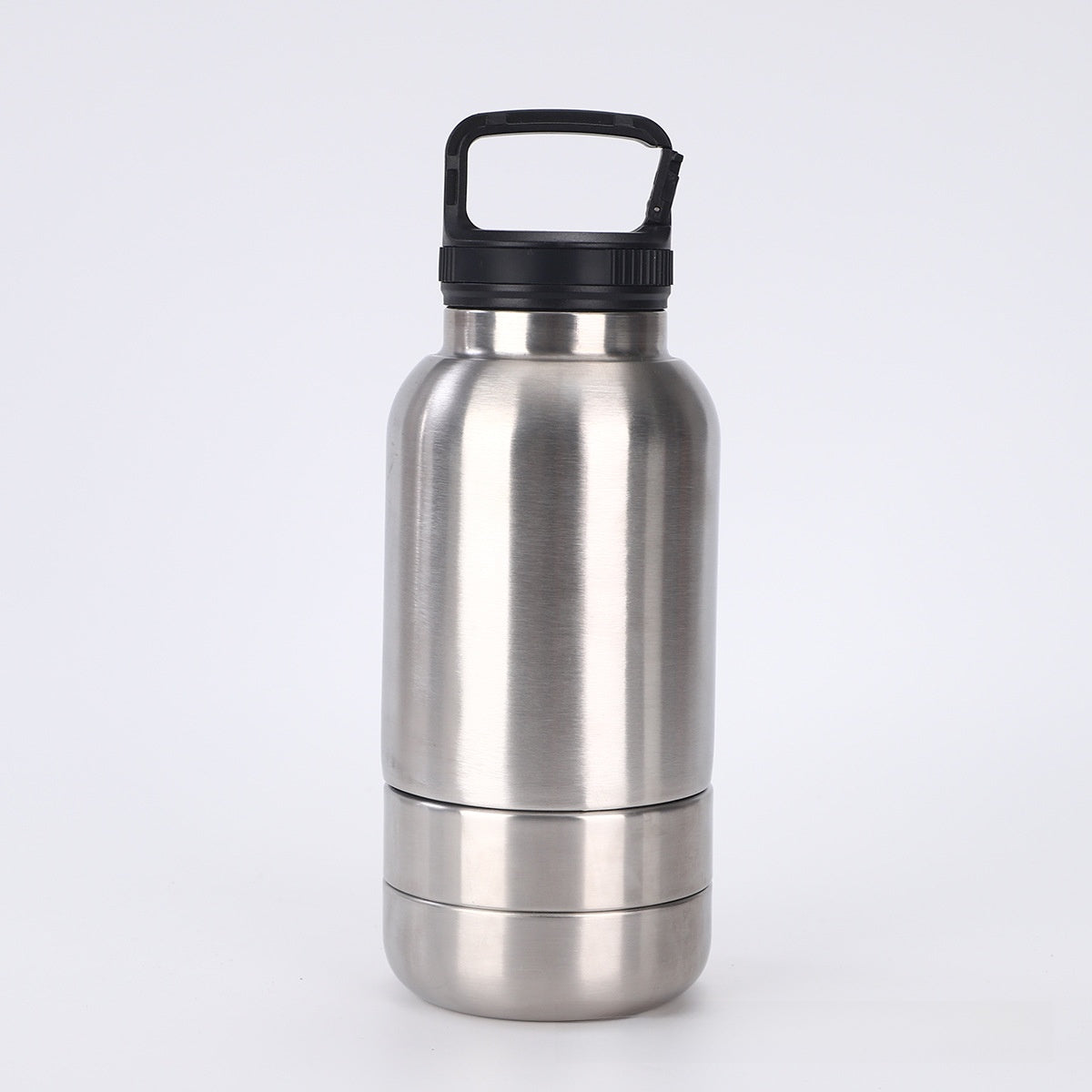 Stainless steel water bottle with black lid on a white background