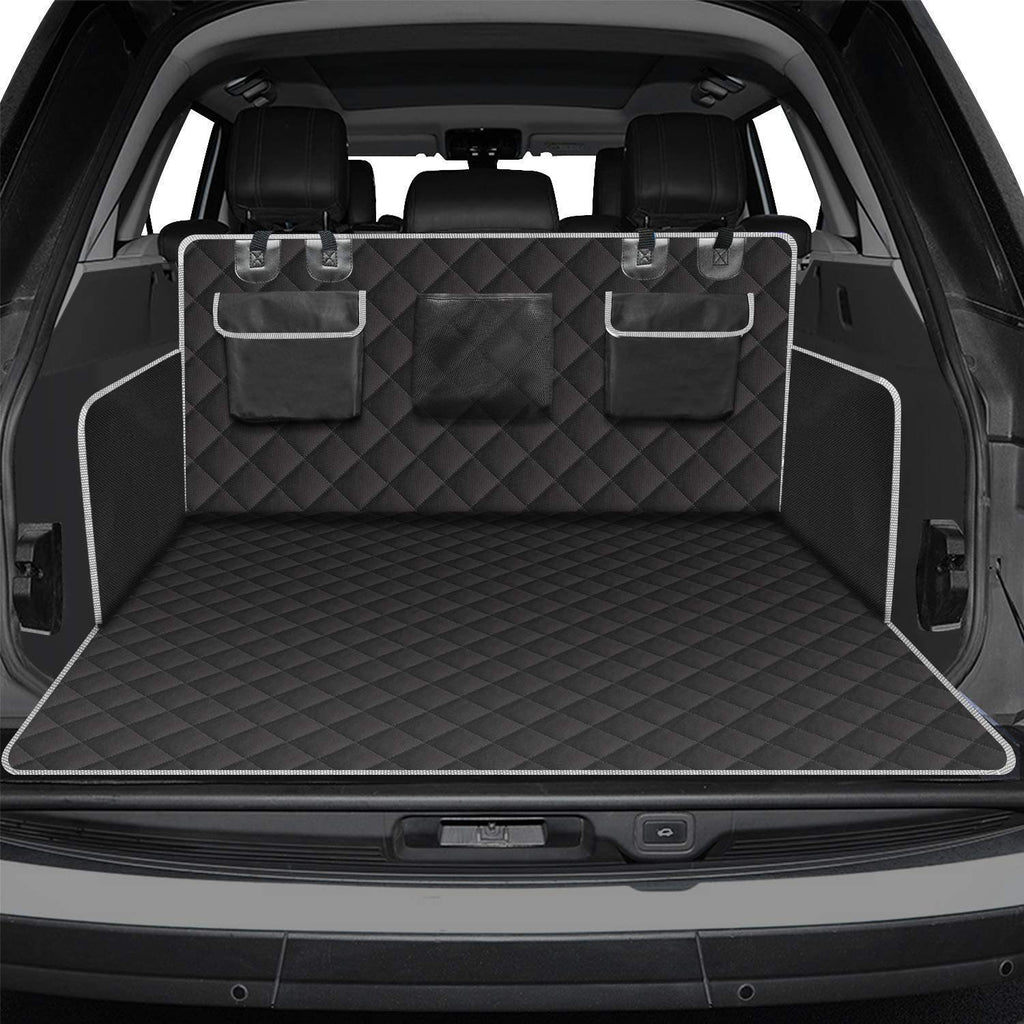 Car trunk with a black quilted cargo liner and storage bins.
